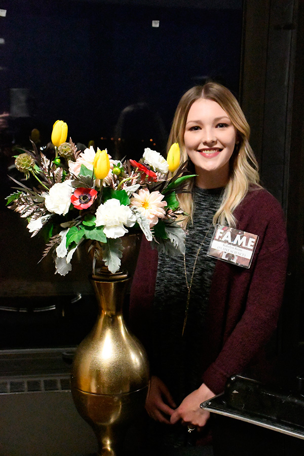 Katelyn Reiss with Floral Design (2019) Photograph by Thomas Sharenborg, Rocheport, Missouri