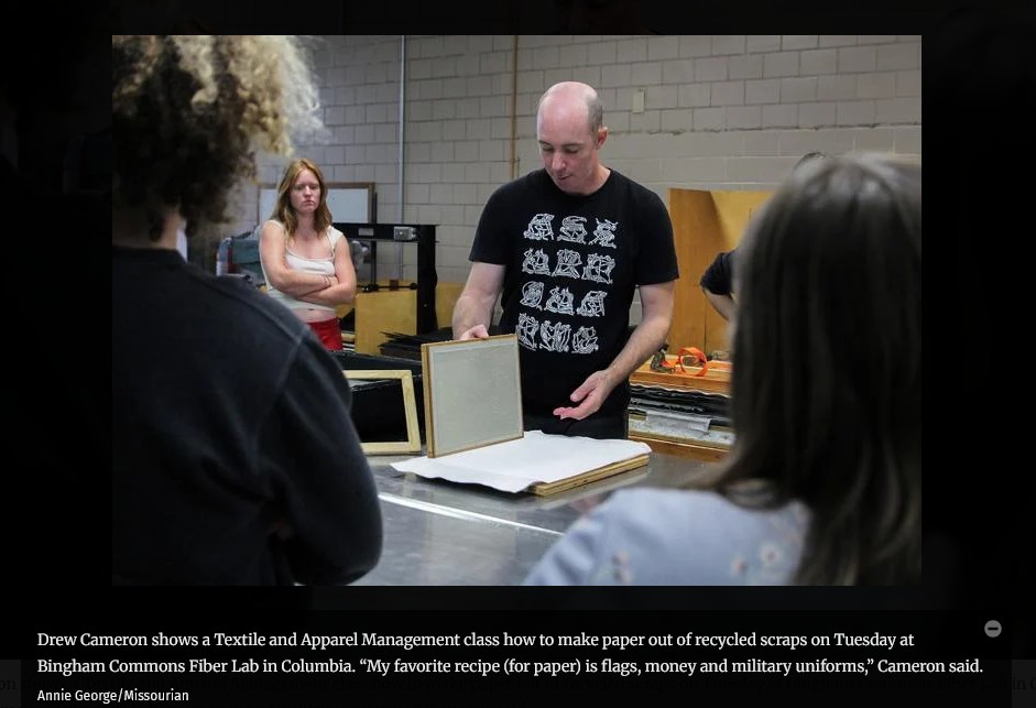 Man surrounded by students
